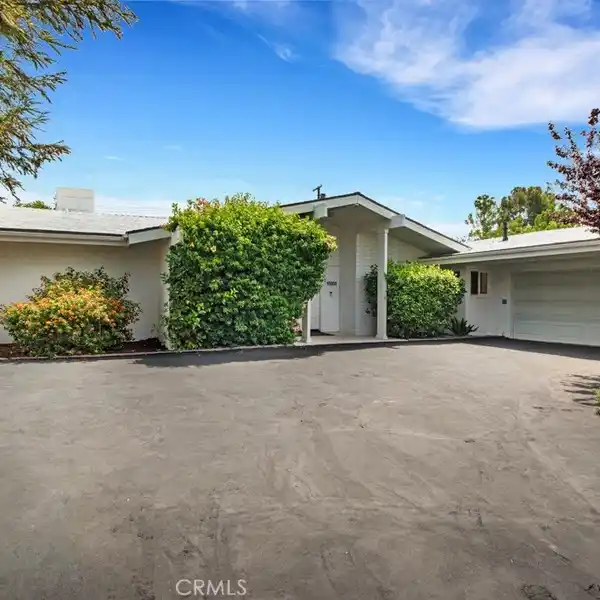 BEAUTIFULLY MAINTAINED HOME FULL OF UPGRADES