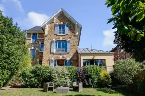 Early 20th-Century Millstone and Brick House