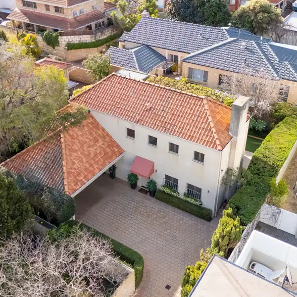 PRIVATE DRIVEWAY LEADS TO ELEGANT FAMILY RETREAT
