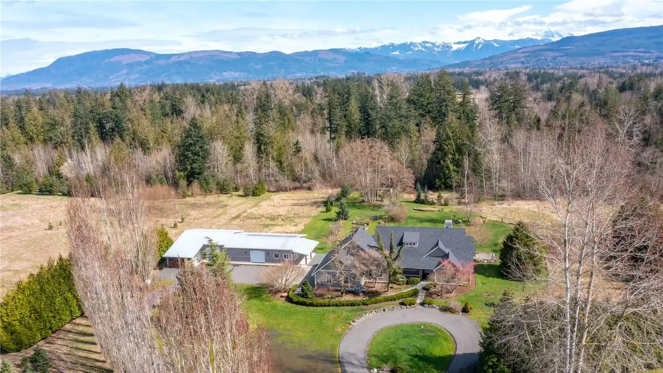 Elegant Rambler with Shop on 4.5 Acres