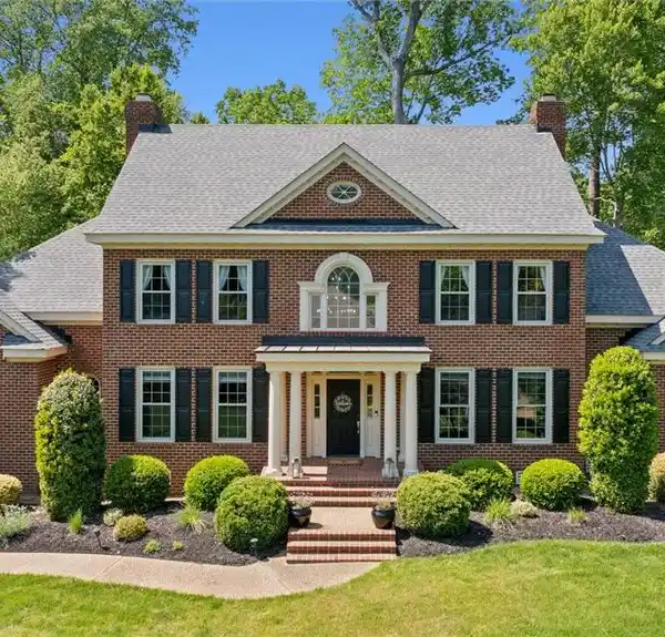 ALL-BRICK COLONIAL WITH A SOPHISTICATED MODERN FLAIR