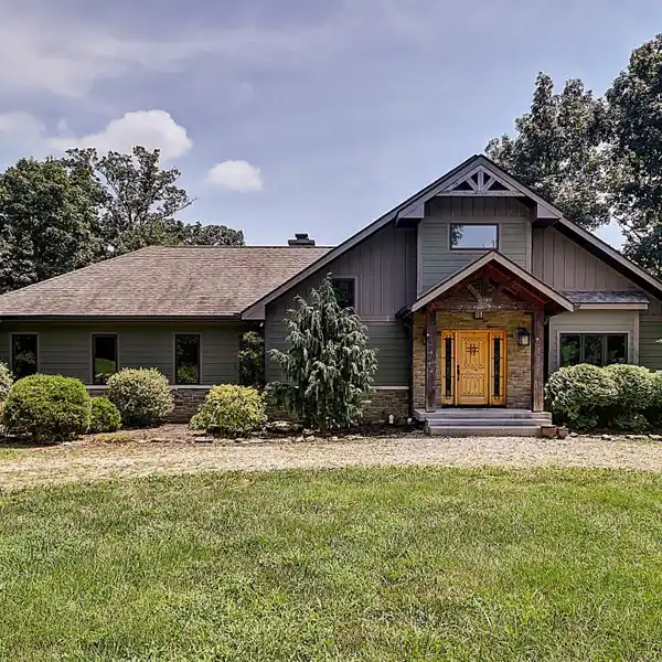 CUSTOM-BUILT RETREAT ON 20 PEACEFUL ACRES
