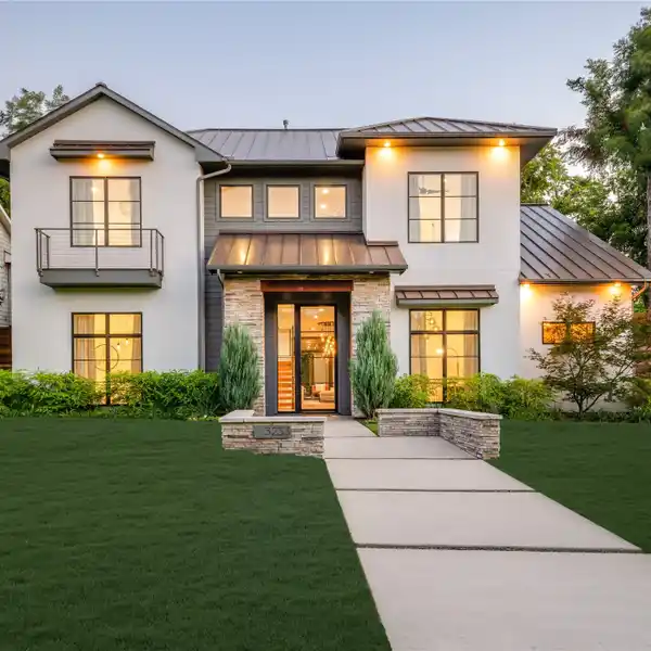 EXQUISITE CUSTOM RESIDENCE WITH LUSH, MODERN LANDSCAPING