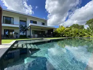 Modern Riverfront Villa with Infinity Pool & Sea Views