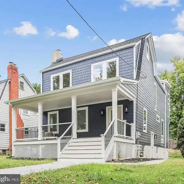 COMPLETELY REDESIGNED AND EXPANDED CRAFTSMAN BUNGALOW