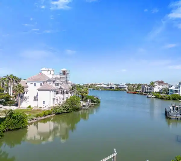 BUILD YOUR DREAM HOME ON THE BAY IN THE BAREFOOT BEACH COMMUNITY