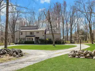 Contemporary Country Colonial on over Nine Acres