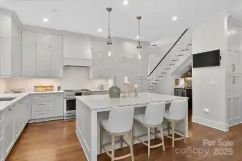 Sophisticated Townhome with Custom Cabinetry, Beverage Bar and Media Room