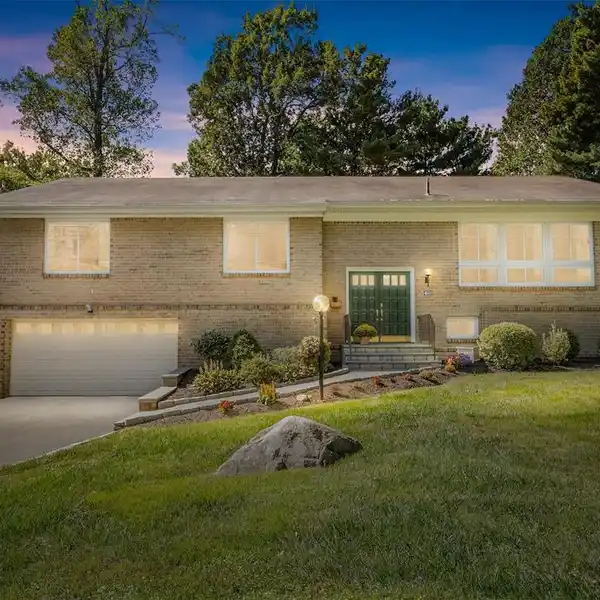 DISTINGUISHED LIGHT BRICK RAISED RANCH