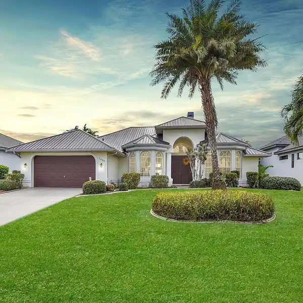 METICULOUSLY MAINTAINED CANAL-FRONT HOME