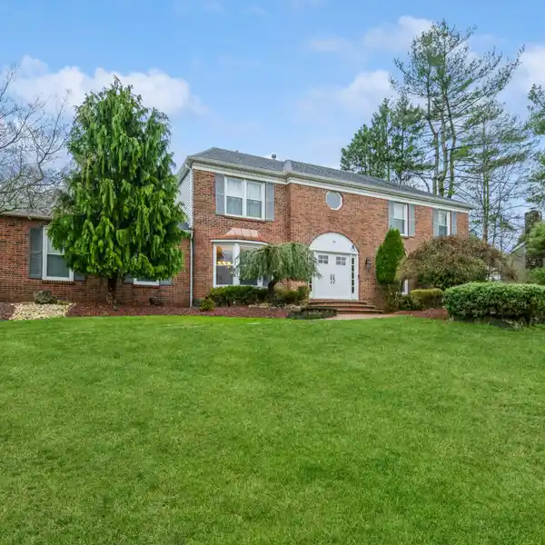 BEAUTIFULLY UPDATED BRICK FRONT COLONIAL