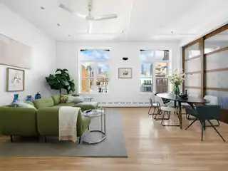 Dramatic and Creative Penthouse Filled with Abundant Natural Light