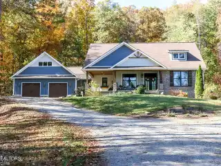 Stunning Custom Home on Five Private Wooded Acres