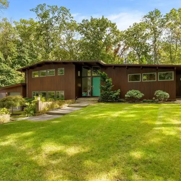 MID-CENTURY GEM WITH VAULTED BEAMED CEILINGS