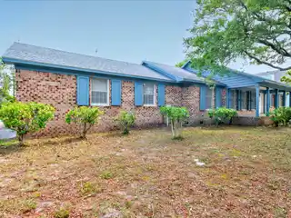 A Rare Intracoastal Offering — Iconic Oak Island Estate on Two Expansive Waterfront Lots