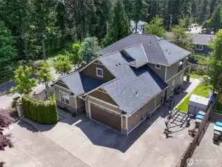 Open-concept Stunner with Shared Dock and Lift on Lake Tapps