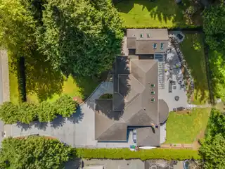 Elegant Estate with Serene Creekside Backyard