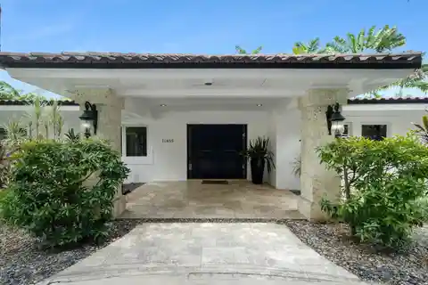 Elevated Living in Gated One-Acre Pinecrest Estate