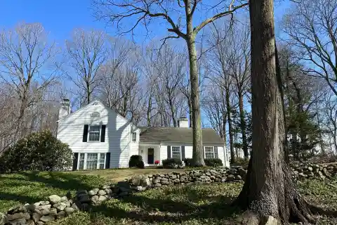 Timeless Elegance and Modern Comfort on Nearly Four Acres