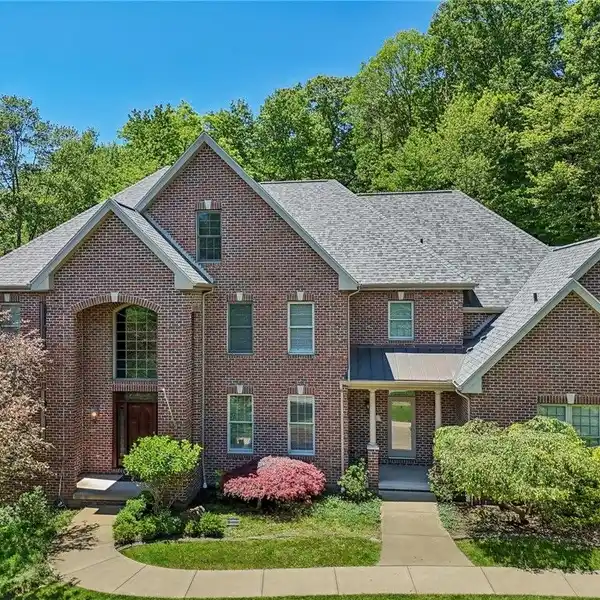 EXTRAORDINARY ALL BRICK HOME IN PRESTIGIOUS LAKE MACLEOD