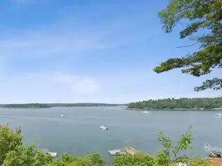 Rare Waterfront Acreage with Classic Coastal Cottage