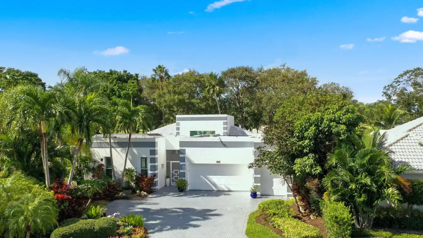 Courtyard Home in Exclusive Sutton Place at Hunters Run