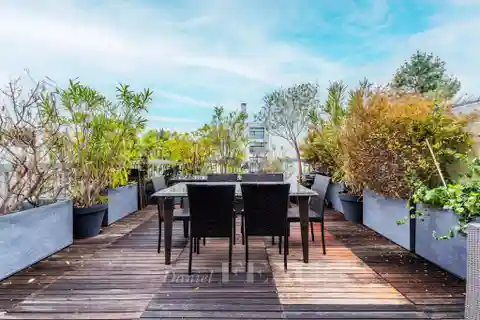 Duplex Apartment with Expansive Terrace and Balconies