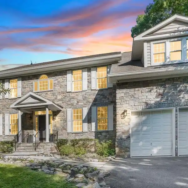 LUXURIOUS STONE-FRONT HOME WITH OUTDOOR OASIS