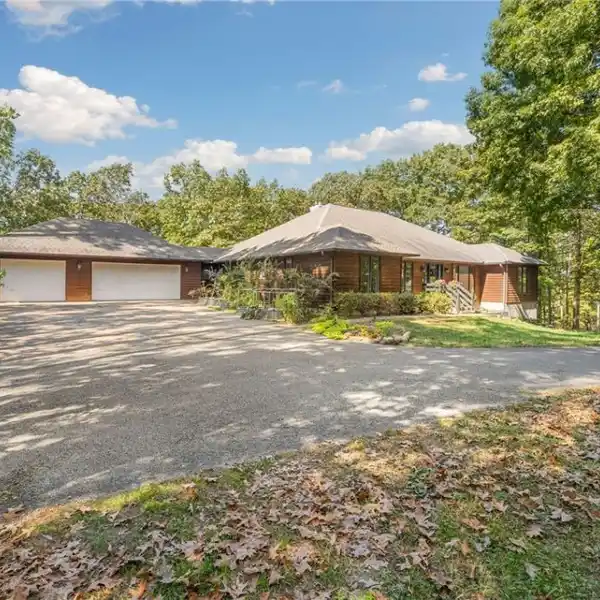 LUXURIOUS WOODED ESTATE IN GATED COMMUNITY