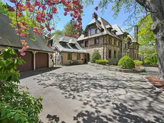 Stunning Tudor Mansion in a Prestigious Neighborhood