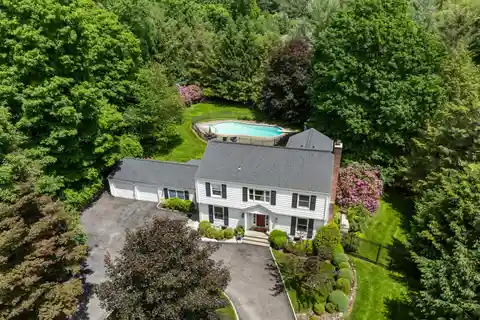 Expanded Colonial Home Blending Luxury and Charm