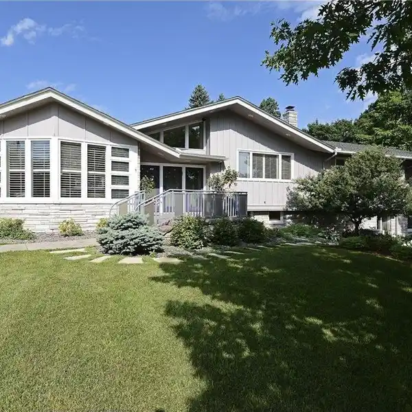 MID-CENTURY MODERN LUXURY HOME STEPS FROM CEDAR LAKE