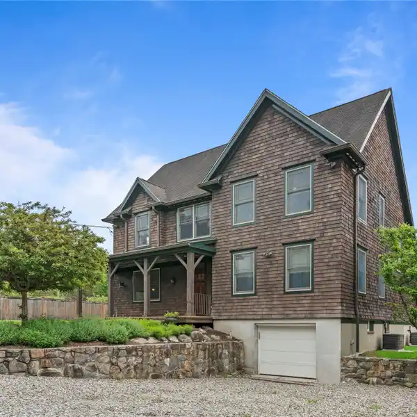 SPACIOUS SHINGLE-STYLE HOME ON OVER ONE ACRE