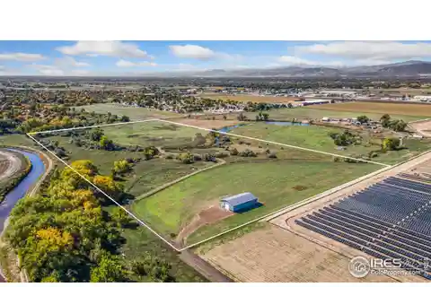 Expansive Acreage with Pond and Mountain Views