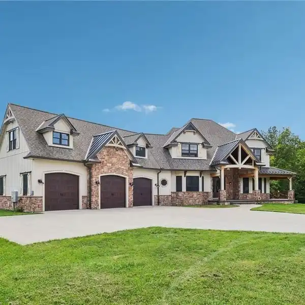 SECLUDED 14-ACRE ESTATE WITH PANORAMIC WOODED VIEWS