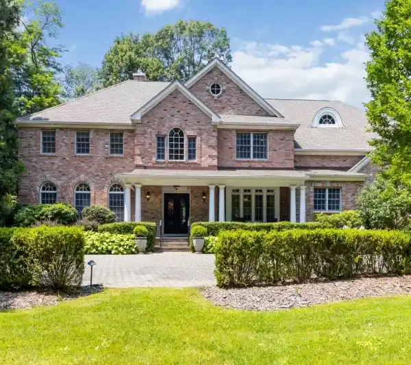 STUNNING CUSTOM HOME IN THE SOUGHT-AFTER SPRING BROOK SECTION