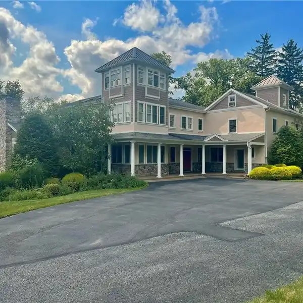 GORGEOUS CUSTOM HOME ON FOUR-PLUS ACRES