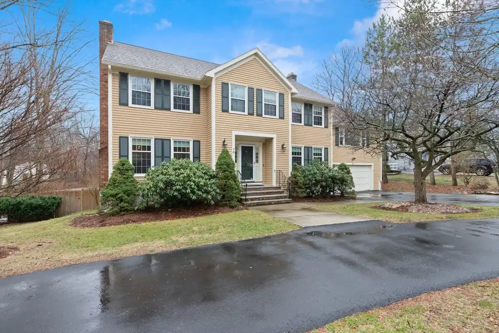 Center-entrance Colonial on a Professionally Landscaped Lot