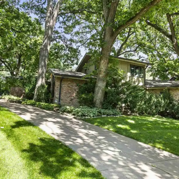 ONE-OF-A-KIND CUSTOM HOME WITH THOUGHTFUL UPDATES