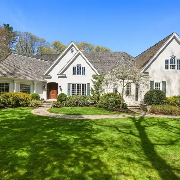 DISTINCTIVE LUXURY HOME ON PARK-LIKE GROUNDS