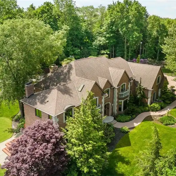 BEAUTIFUL BRICK HOME ON 19 ACRES