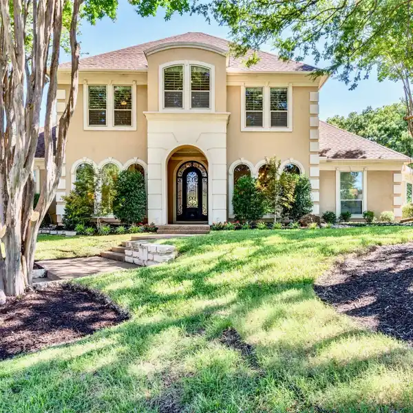 EXQUISITELY REMODELED EXECUTIVE HOME IN TIMBER LAKE
