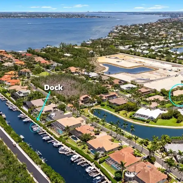 CUSTOM WATERFRONT HOME IN GATED CATALPA COVE