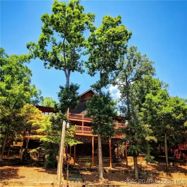 ELEGANT BRICK FIREPLACES MEET GRAND ENTERTAINING SPACES