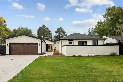 Modern Luxury Home Featuring Vaulted Ceilings and Patio
