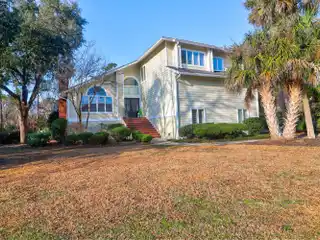 Custom Waterfront Living with Private Airstrip Access