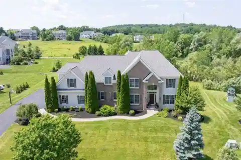 Custom Woodstone Home on Premium Pond Lot