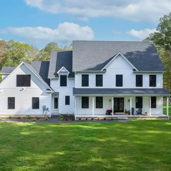 MODERN FARMHOUSE LUXURY ON OVER SIX ACRES