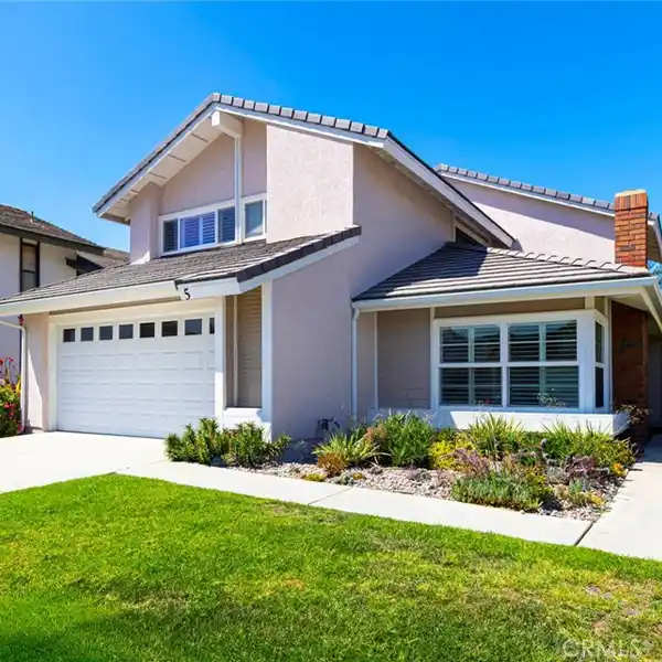 BEAUTIFULLY MAINTAINED HOME IN DESIRABLE WOODBRIDGE