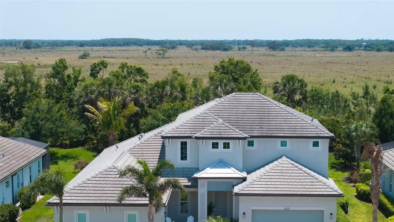 Exquisite Pool Home in Gated Rivo Lakes